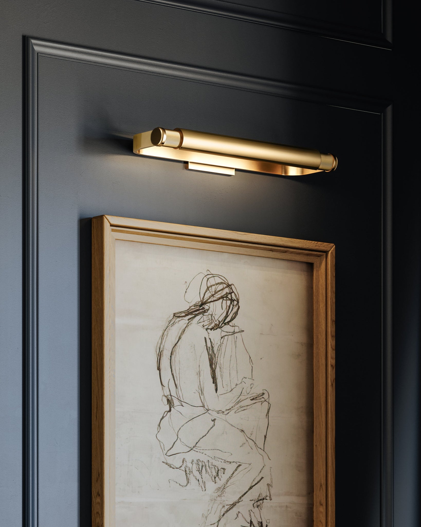 Close-up of the Elm Park Picture Light 24" in aged brass showing the arm curve and shade proportion.