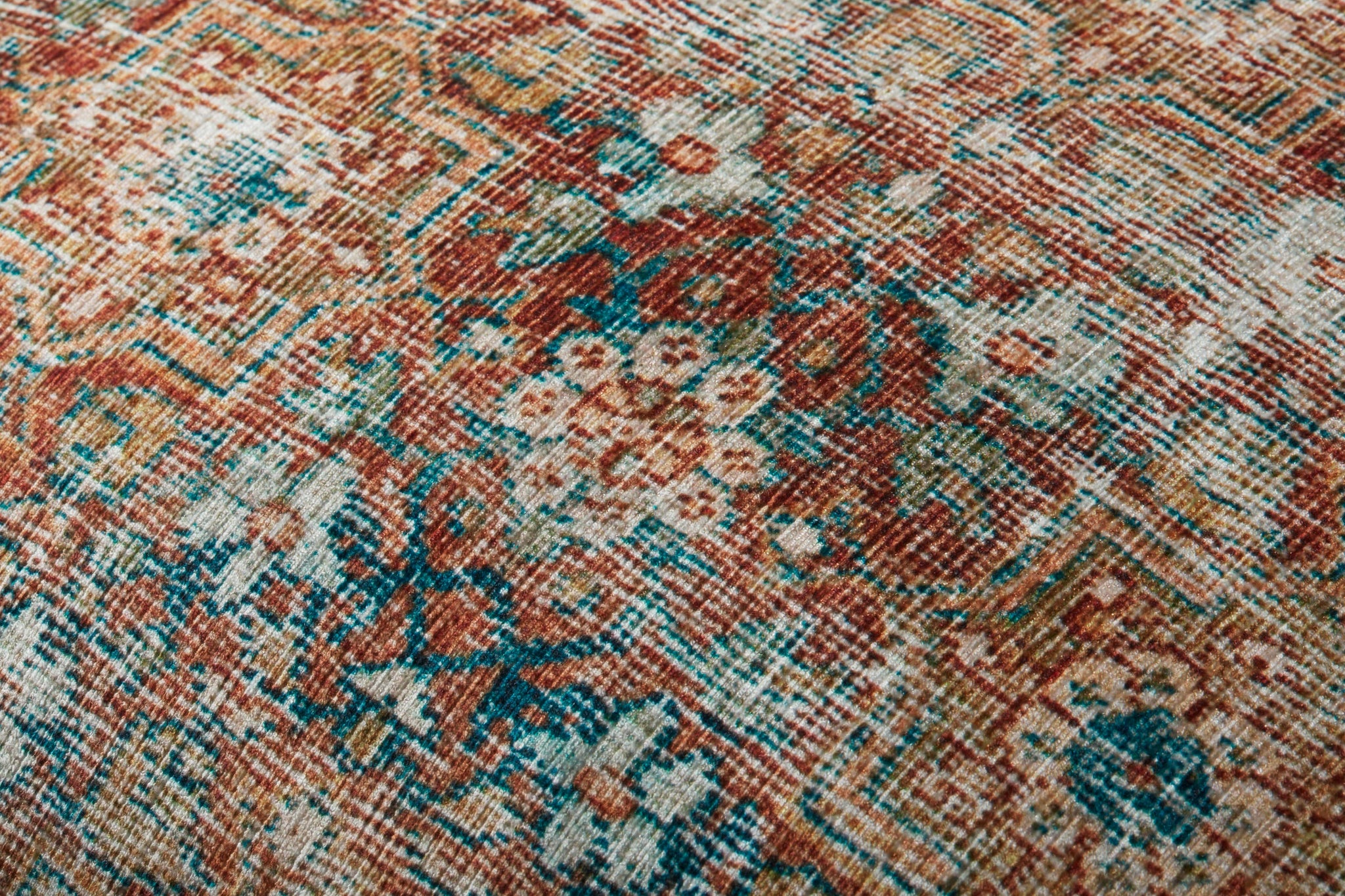 Terracotta / Multi Pillow shown from a different angle to reveal its pattern.