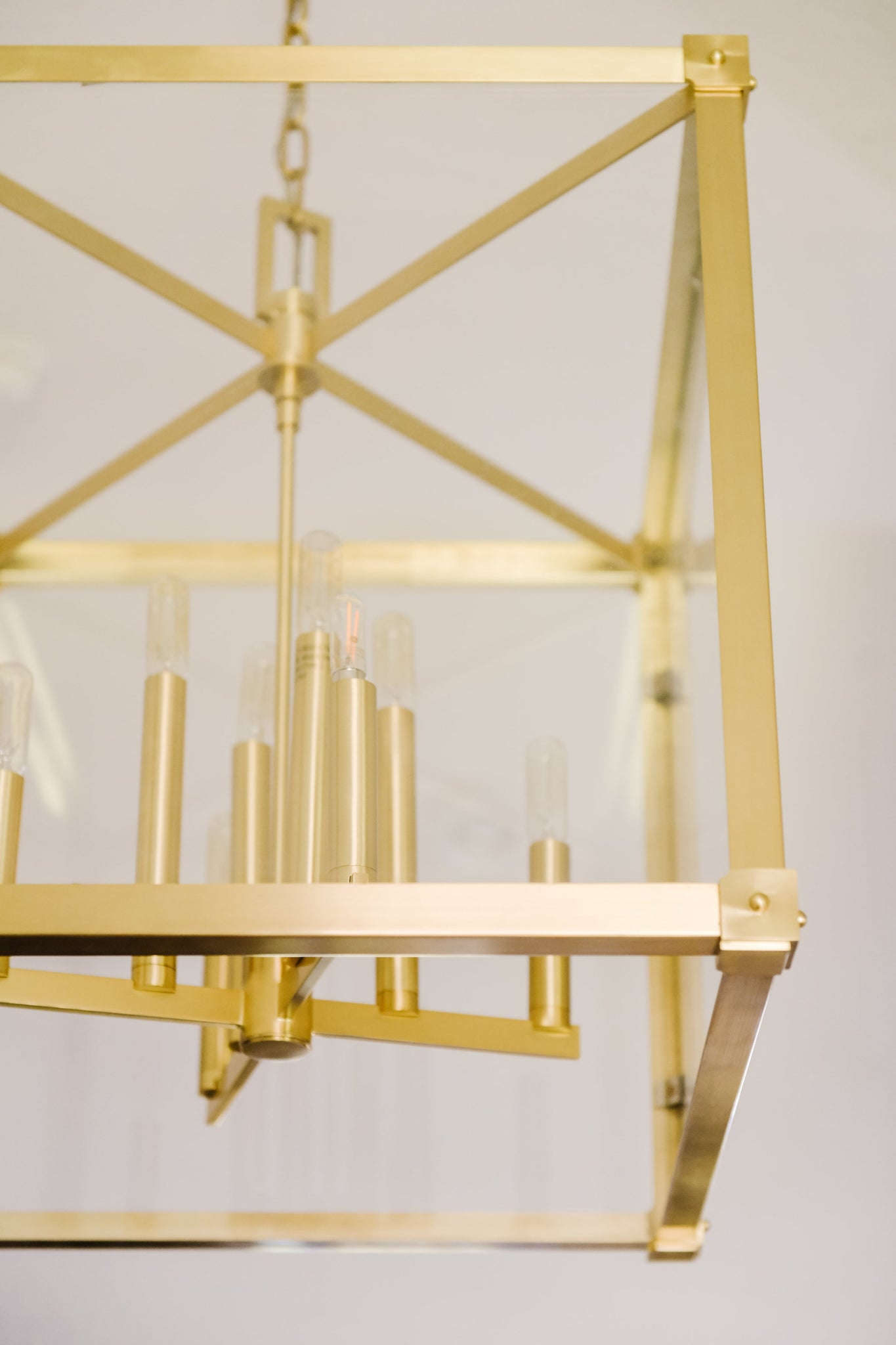 Forsyth Lantern 20.25" in aged brass styled in a foyer for warm, layered light at Laurie Yapp Home.