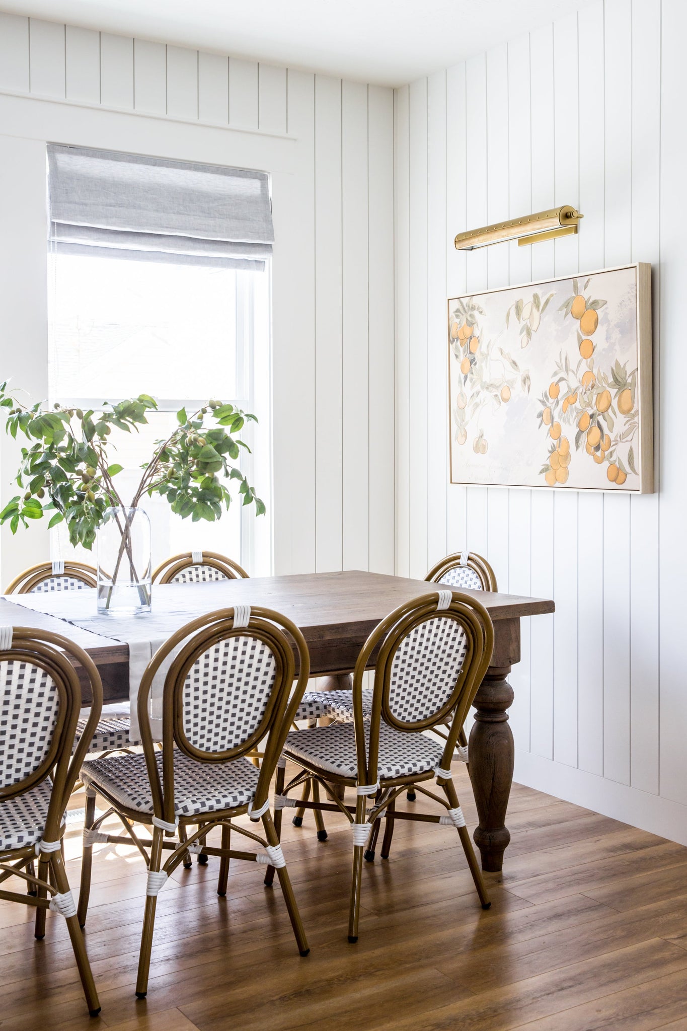Gaines Picture Light 18.25" in aged brass styled in a gallery wall for warm, layered light at Laurie Yapp Home.