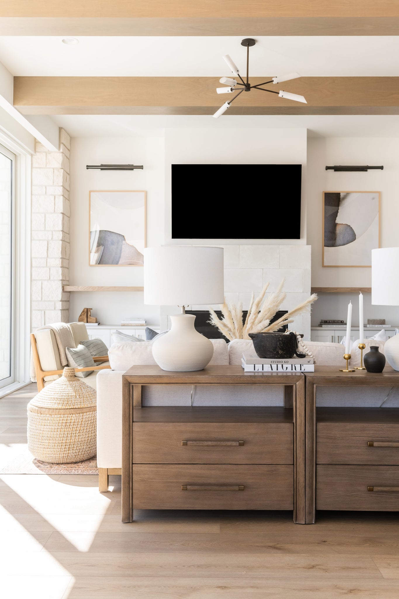 Ridgewood Picture Light 30" in dark bronze styled in a reading room for warm, layered light at Laurie Yapp Home.