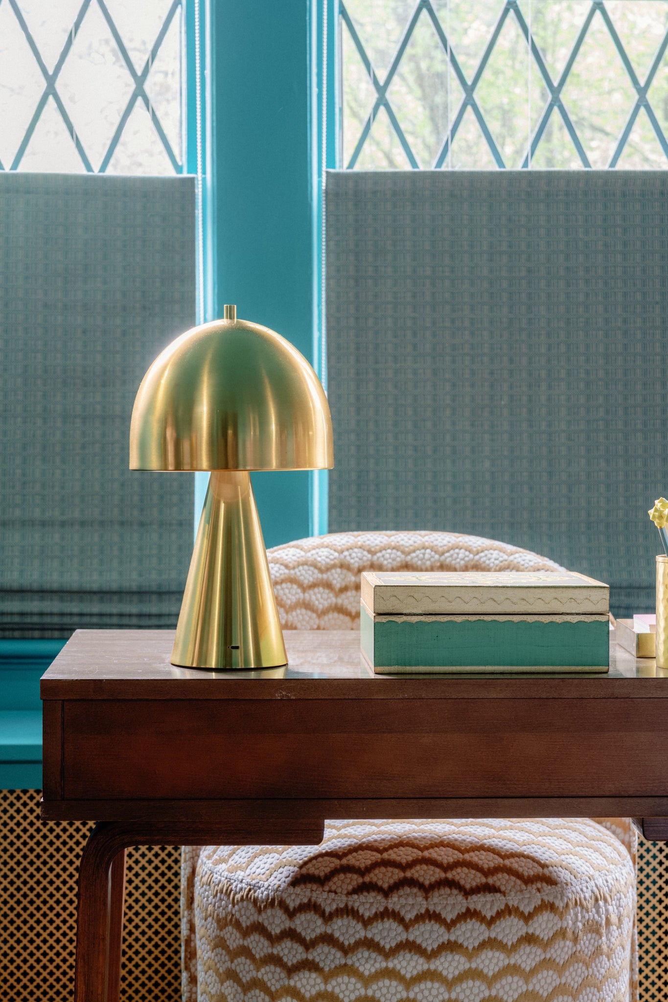 Hopkinton Rechargeable Table Lamp in aged brass styled in a curated interior for warm, layered light at Laurie Yapp Home.