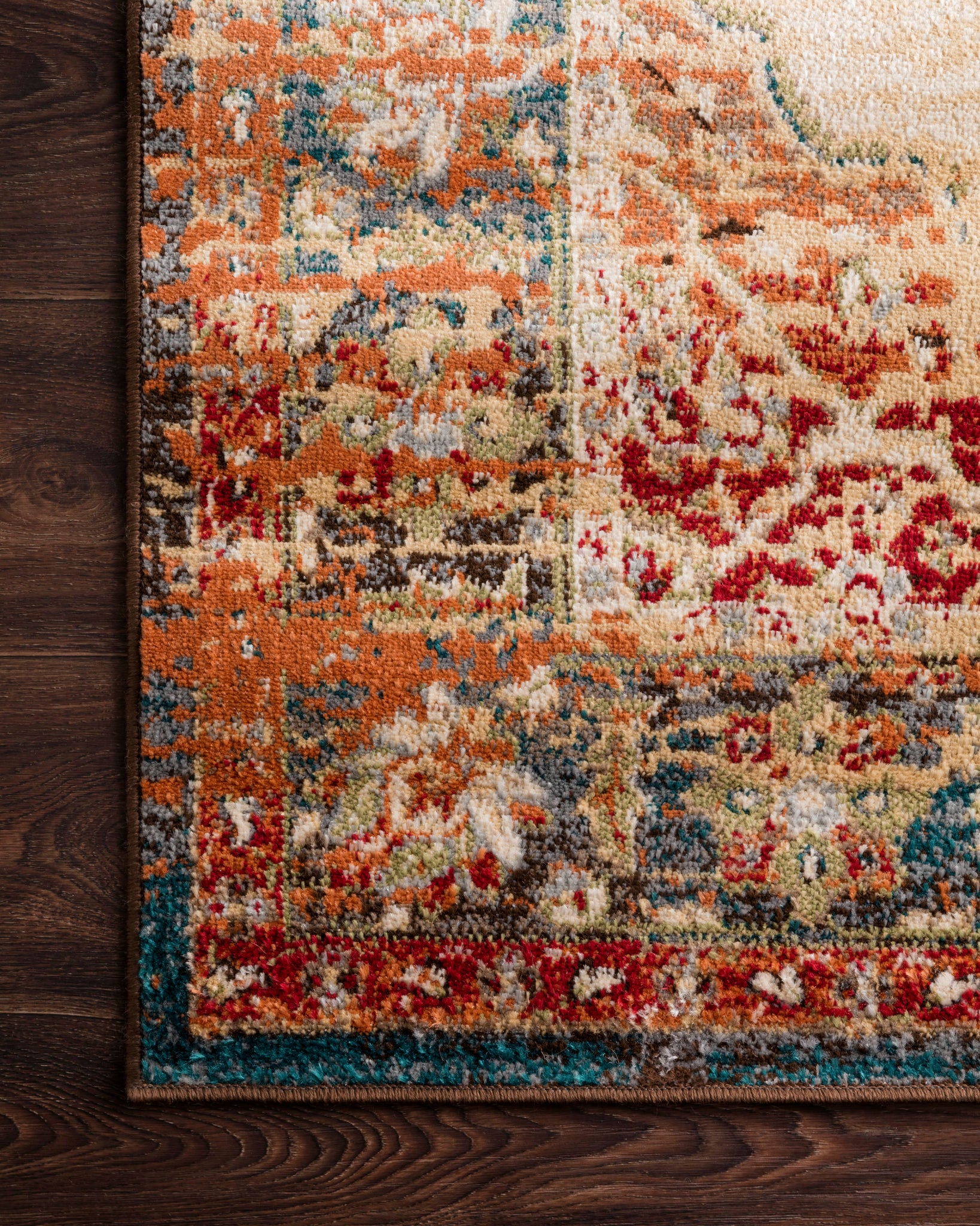 Isadora Ant. Ivory / Sunset styled in a living room at Laurie Yapp Home.