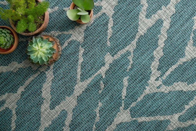 Isle Teal / Grey shown from a different angle to reveal its pattern.