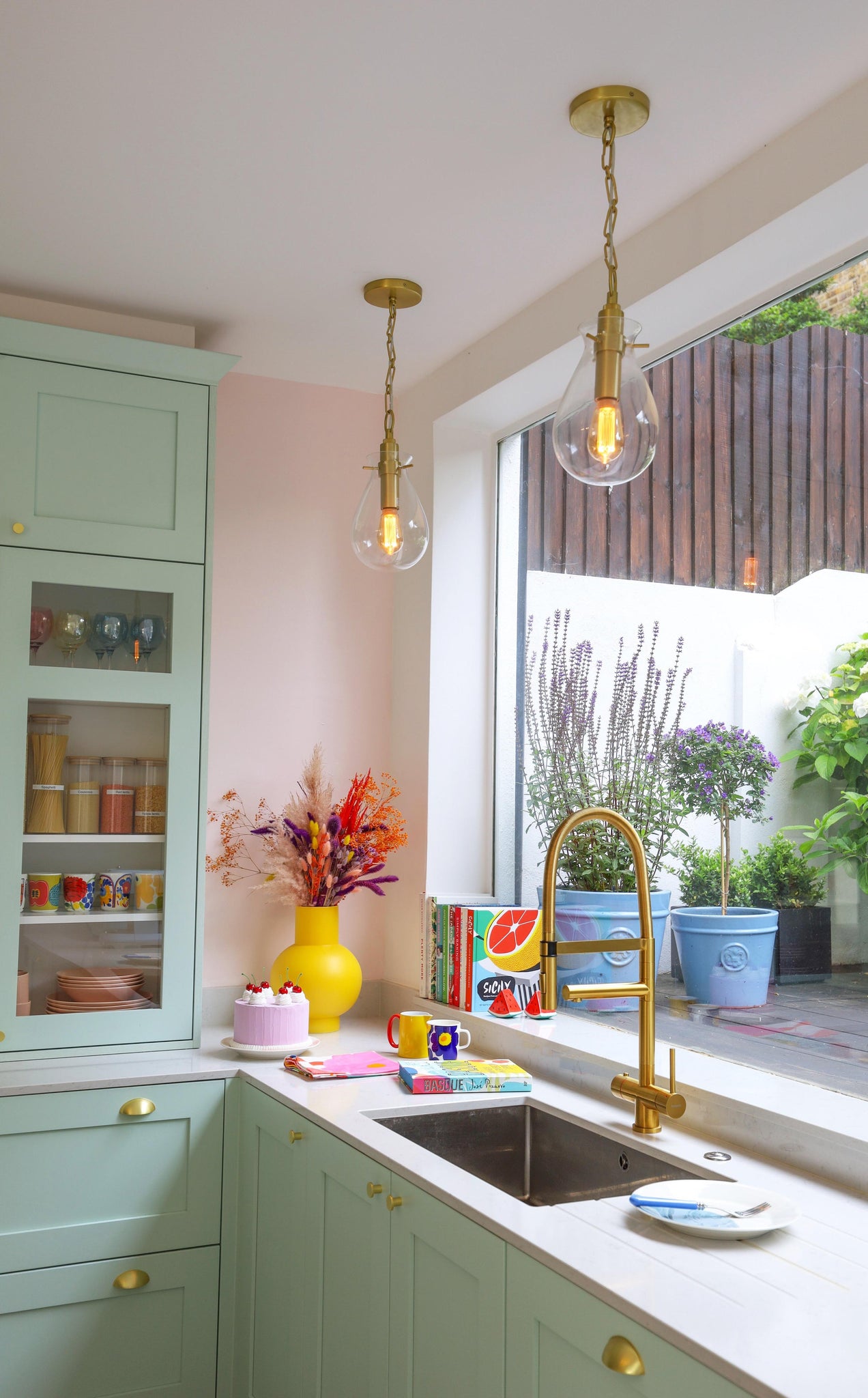 Ivy Pendant 7.5" in aged brass styled in an elegant dining room for warm, layered light at Laurie Yapp Home.