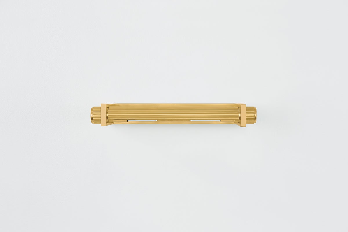 Judd Picture Light 18.5" in aged brass shown from the front to reveal the arm curve and shade proportion.