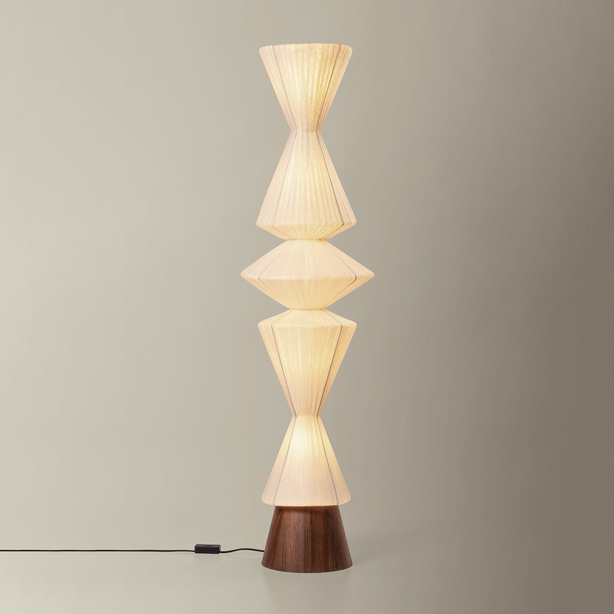 Greendale Floor Lamp in aged brass shown from the front to reveal the stem, base, and shade proportions.