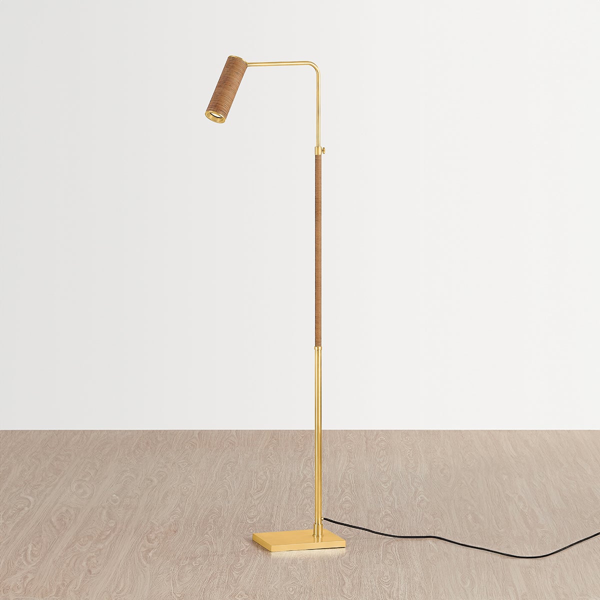 Close-up of the Narragansett Floor Lamp in aged brass showing the stem, base, and shade proportions.