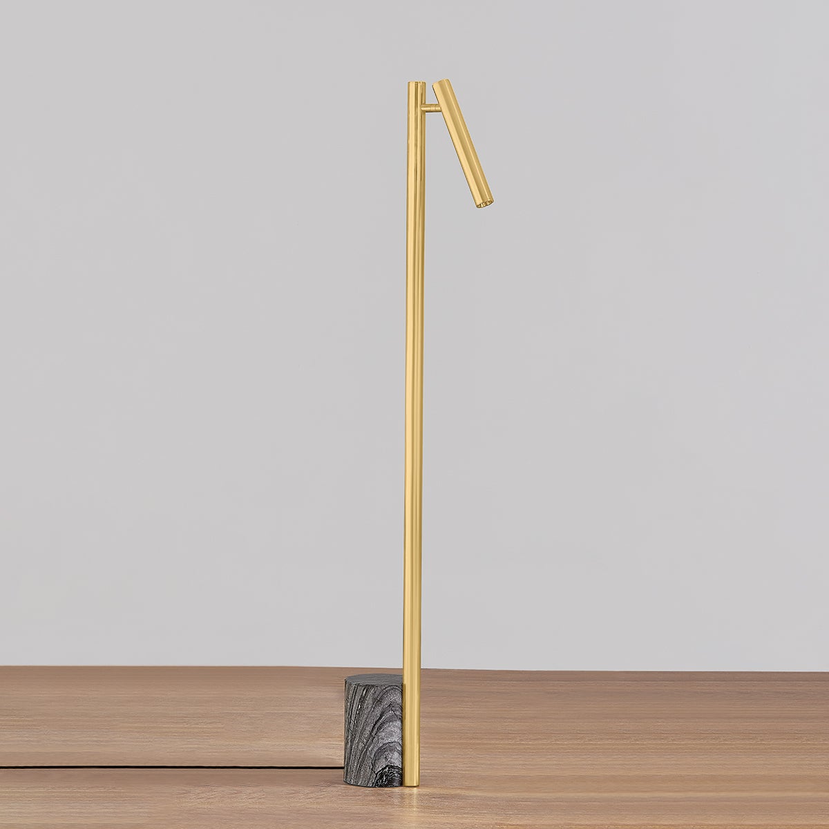 Circleville Floor Lamp in aged brass shown from the front to reveal the stem, base, and shade proportions.
