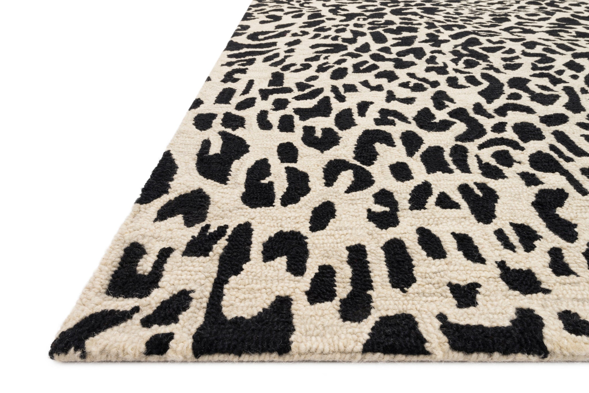 Side view of the Masai Black / Ivory rug.