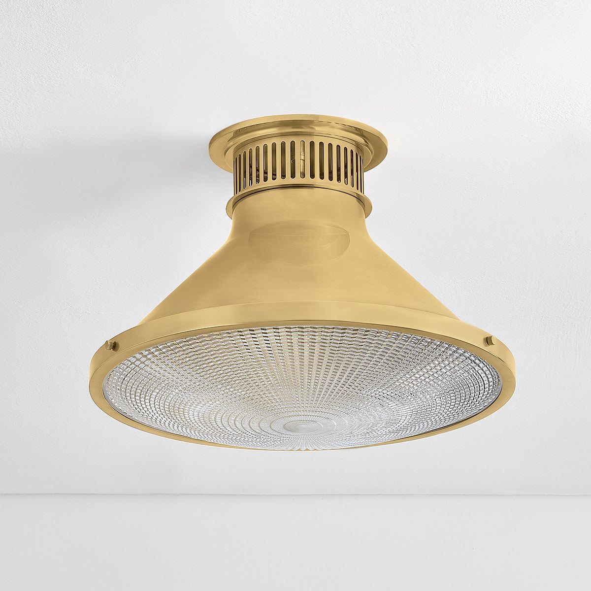Close-up of the Highclere Flush Mount 17.75" in aged brass showing the shade profile and mounting canopy.