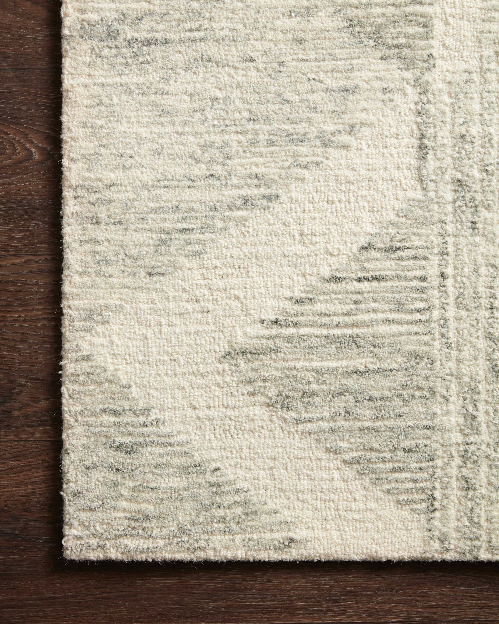Close-up detail of the Milo Lt Grey / Granite showing its pile and weave.