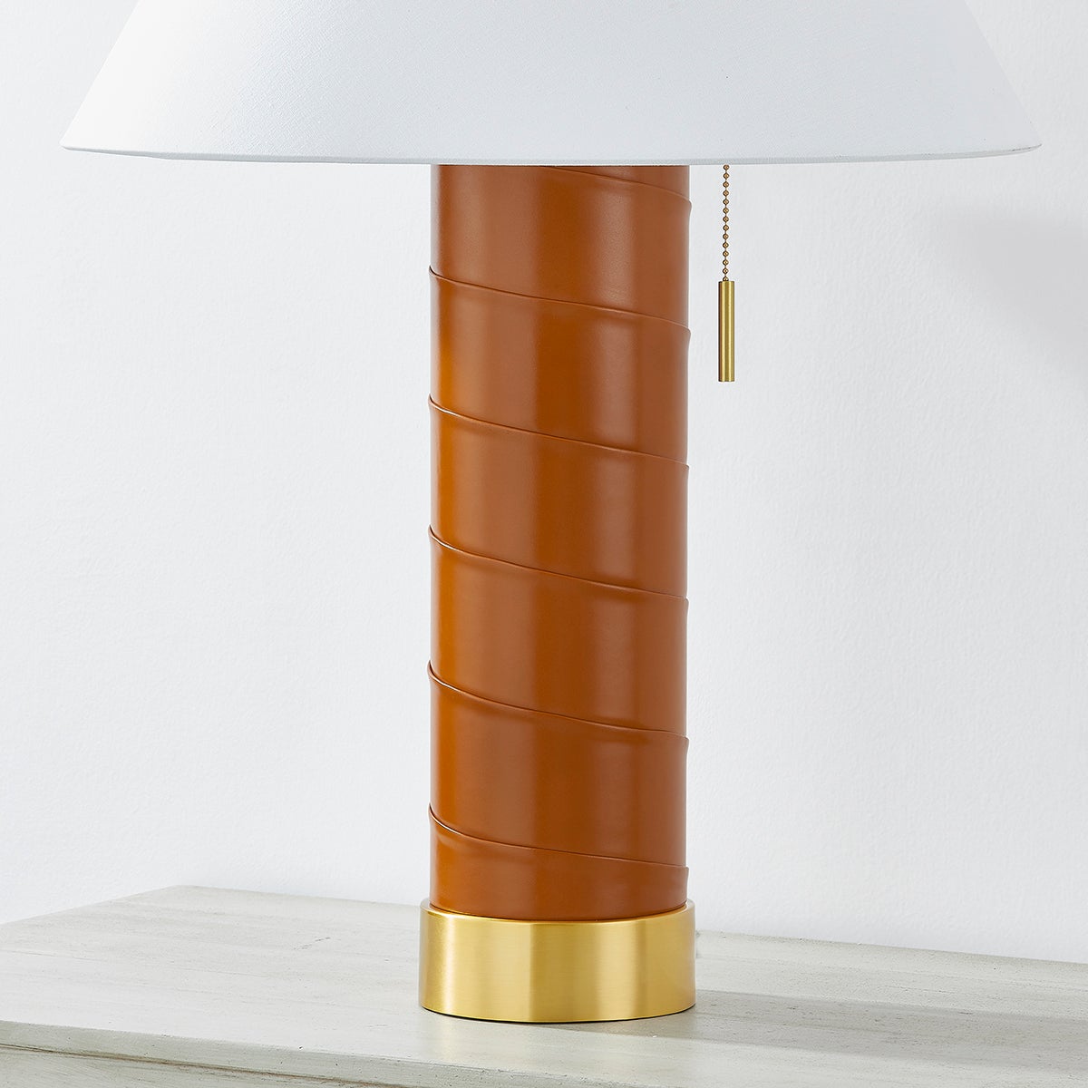 Norwalk Table Lamp in aged brass shown from a second angle to highlight the base and shade proportions.