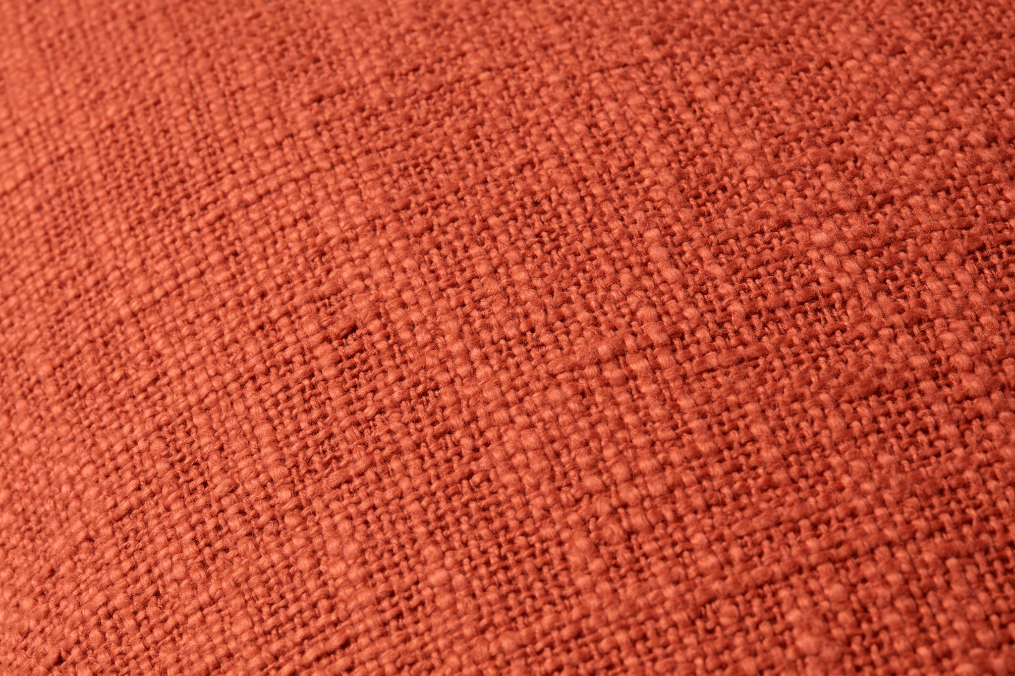 Orange Pillow shown from a different angle to reveal its pattern.