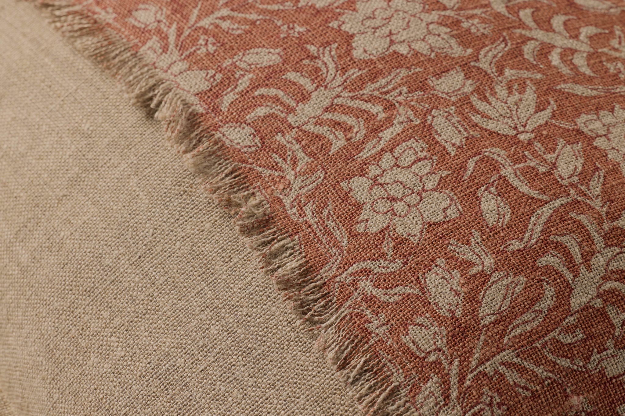 Orange / Natural Pillow shown from a different angle to reveal its pattern.
