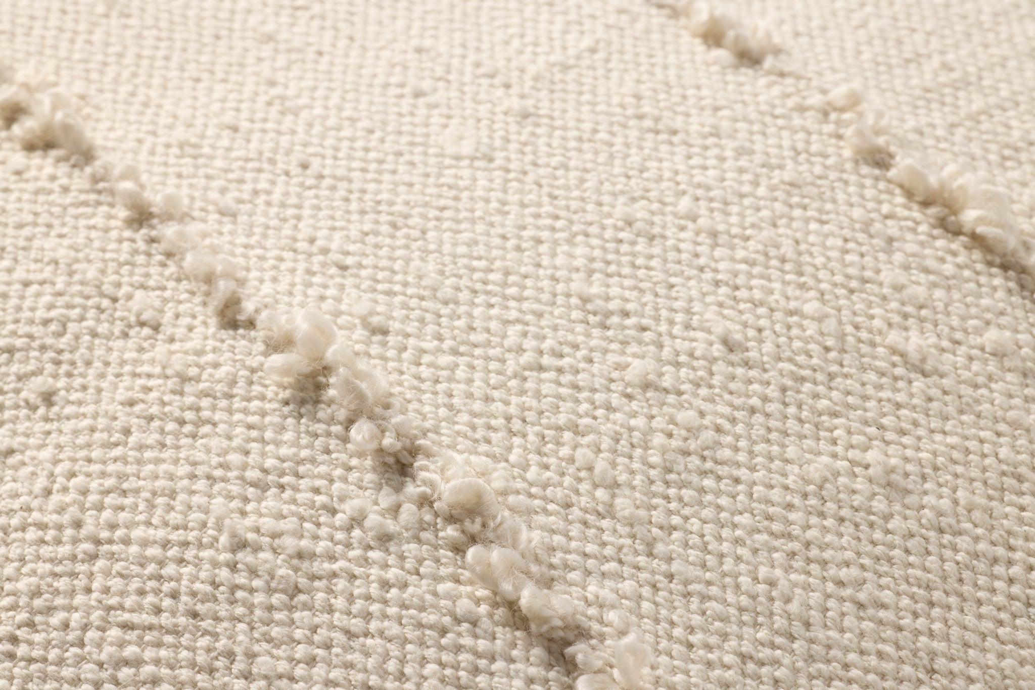Ivory Pillow (Pattern 4) shown from a different angle to reveal its pattern.