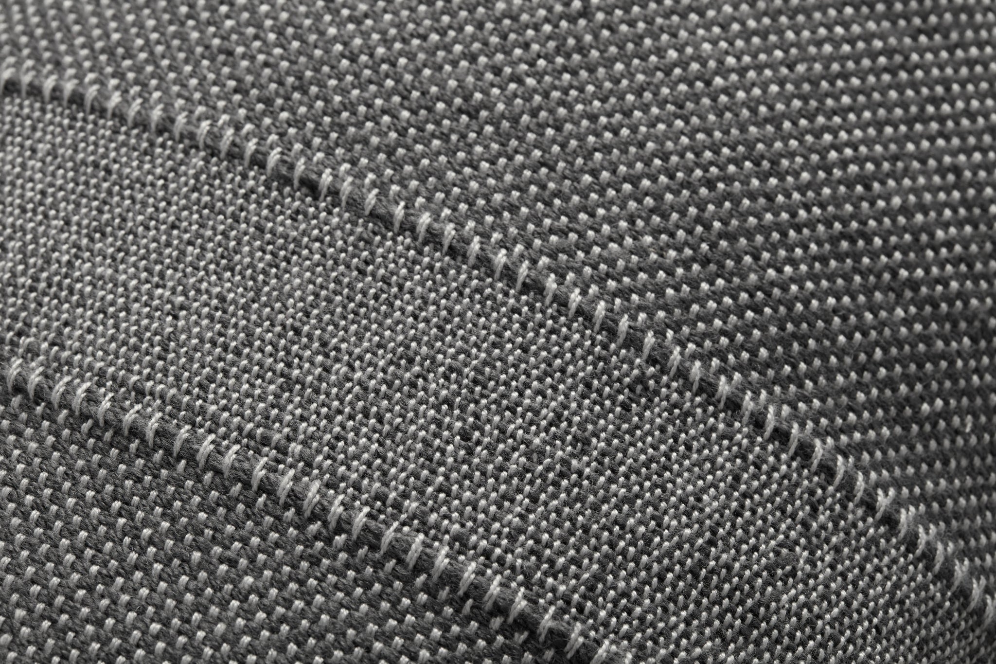 Nadine Slate Pillow shown from a different angle to reveal its pattern.