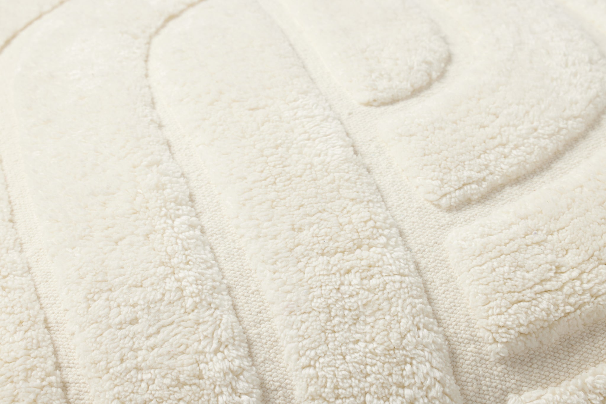 Ivory Pillow (Pattern 7) shown from a different angle to reveal its pattern.