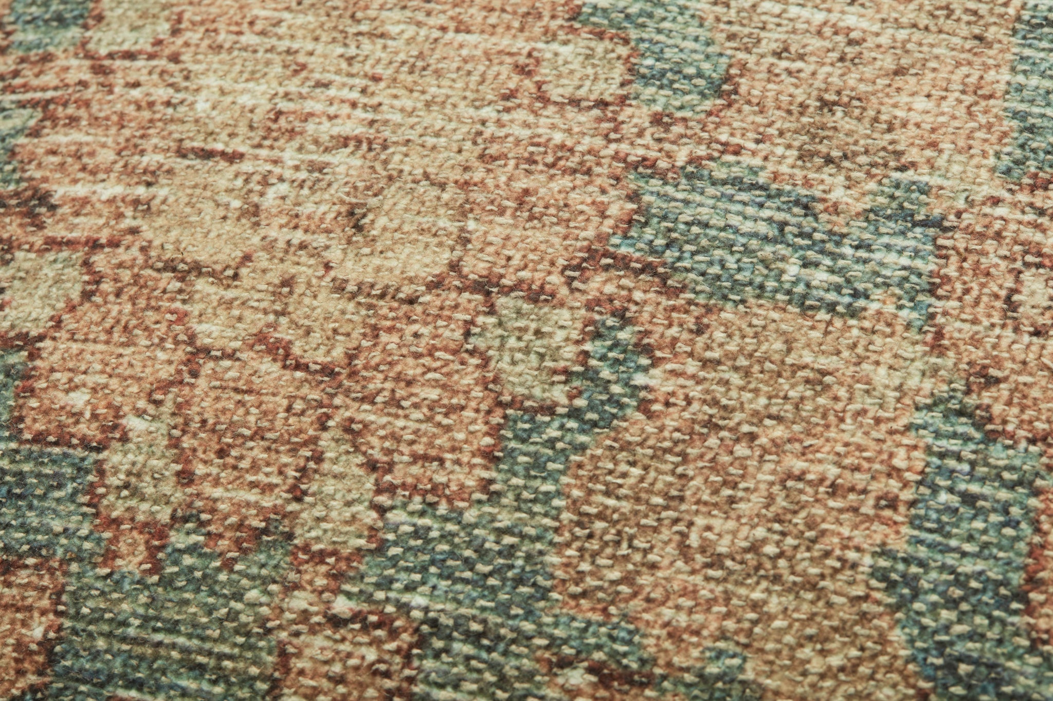 Clay Teal / Terracotta Pillow shown from a different angle to reveal its pattern.