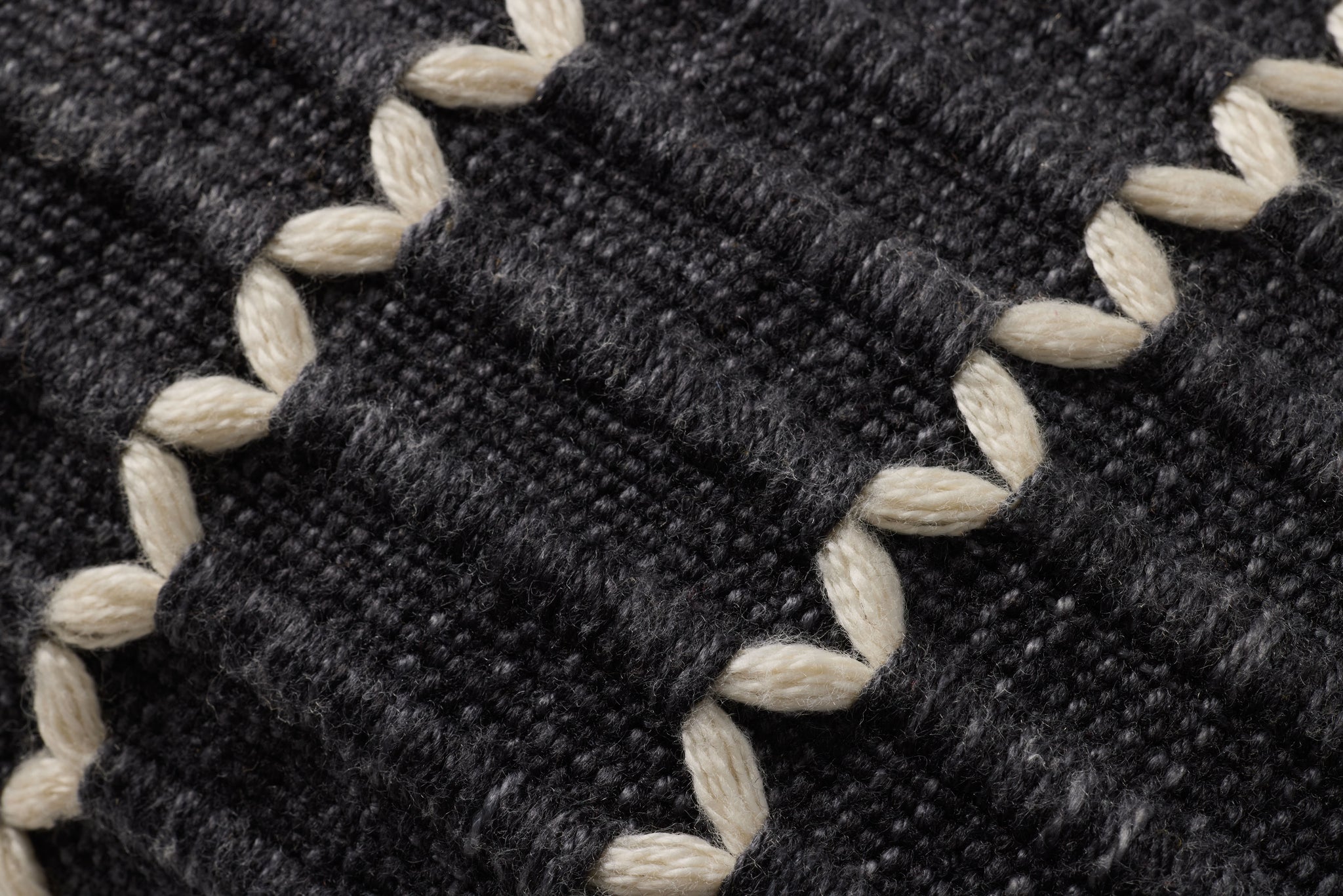 Black Pillow (Pattern 5) shown from a different angle to reveal its pattern.