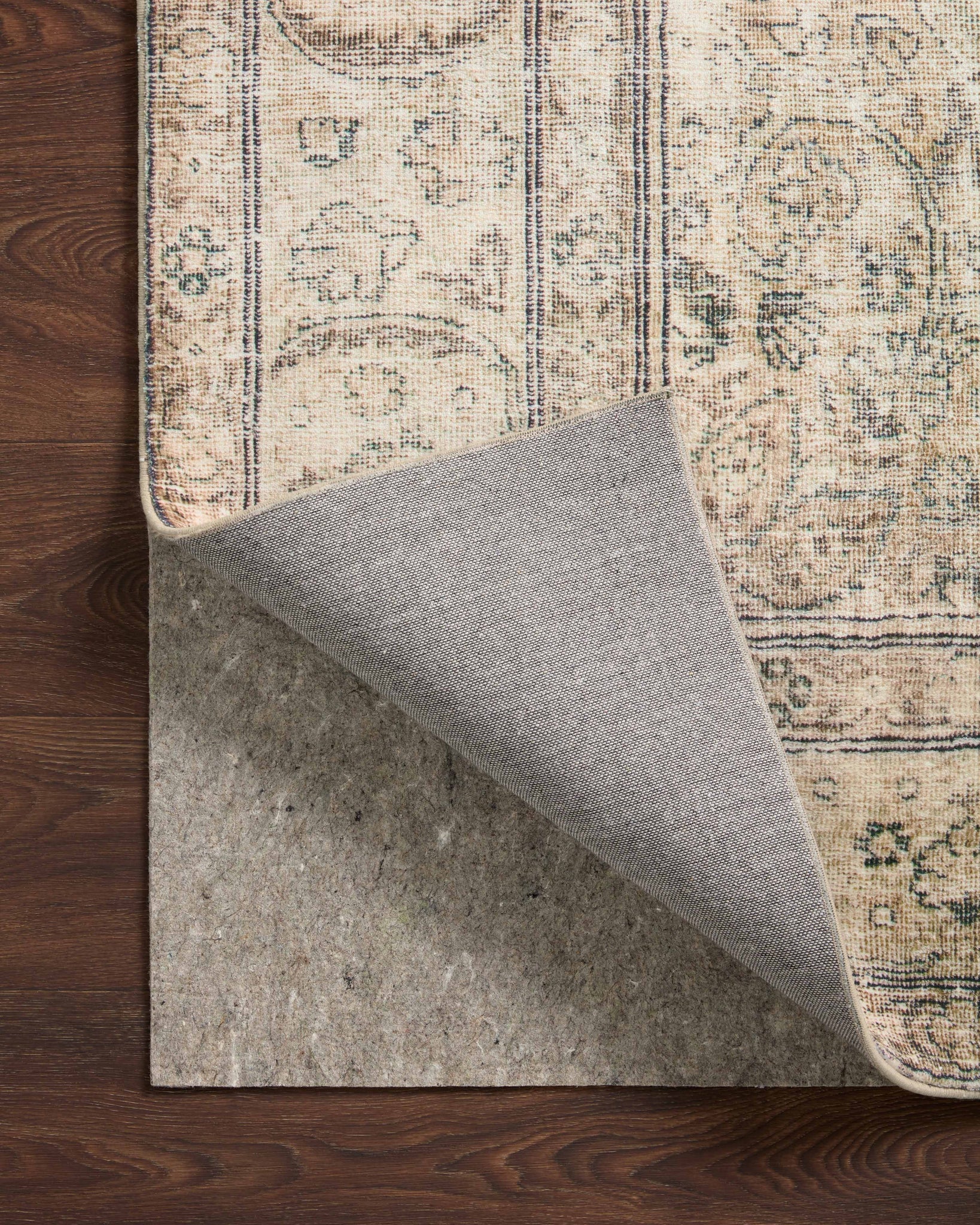 Grip 1/8" Grey Rug Pad shown from a different angle to reveal its pattern.