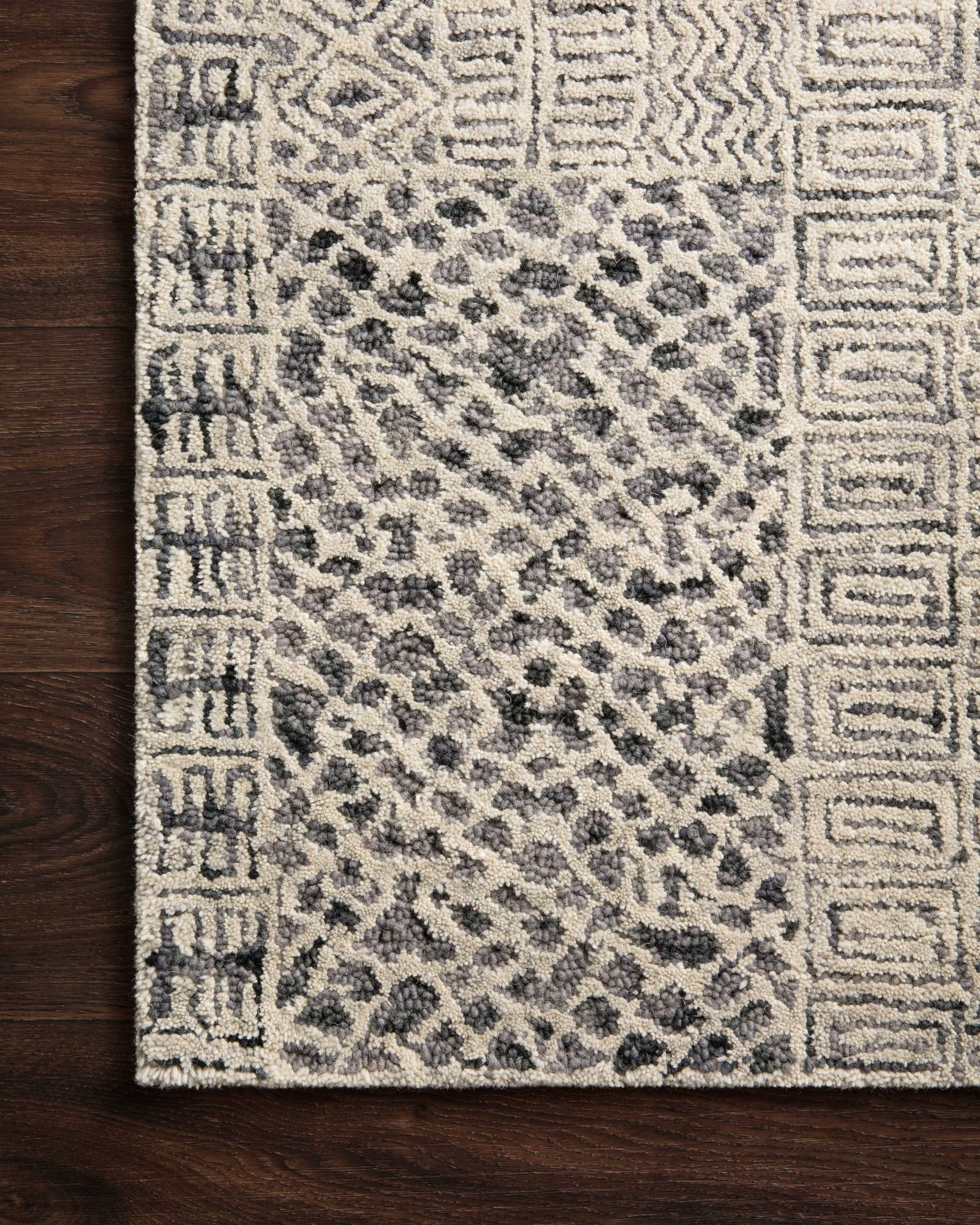 Side view of the Peregrine Charcoal rug.