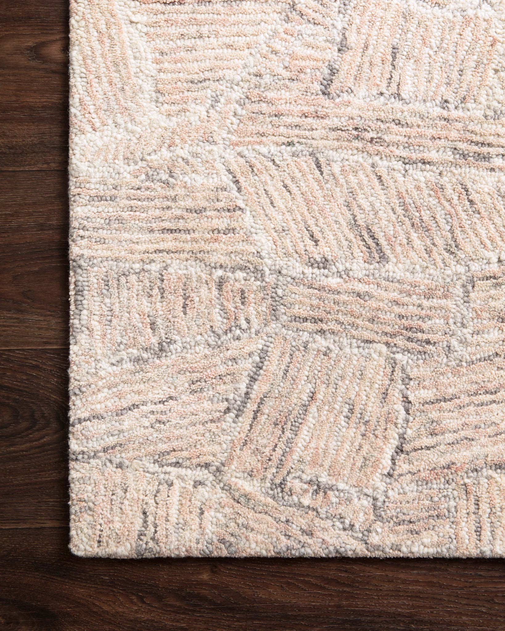 Side view of the Peregrine Blush rug.