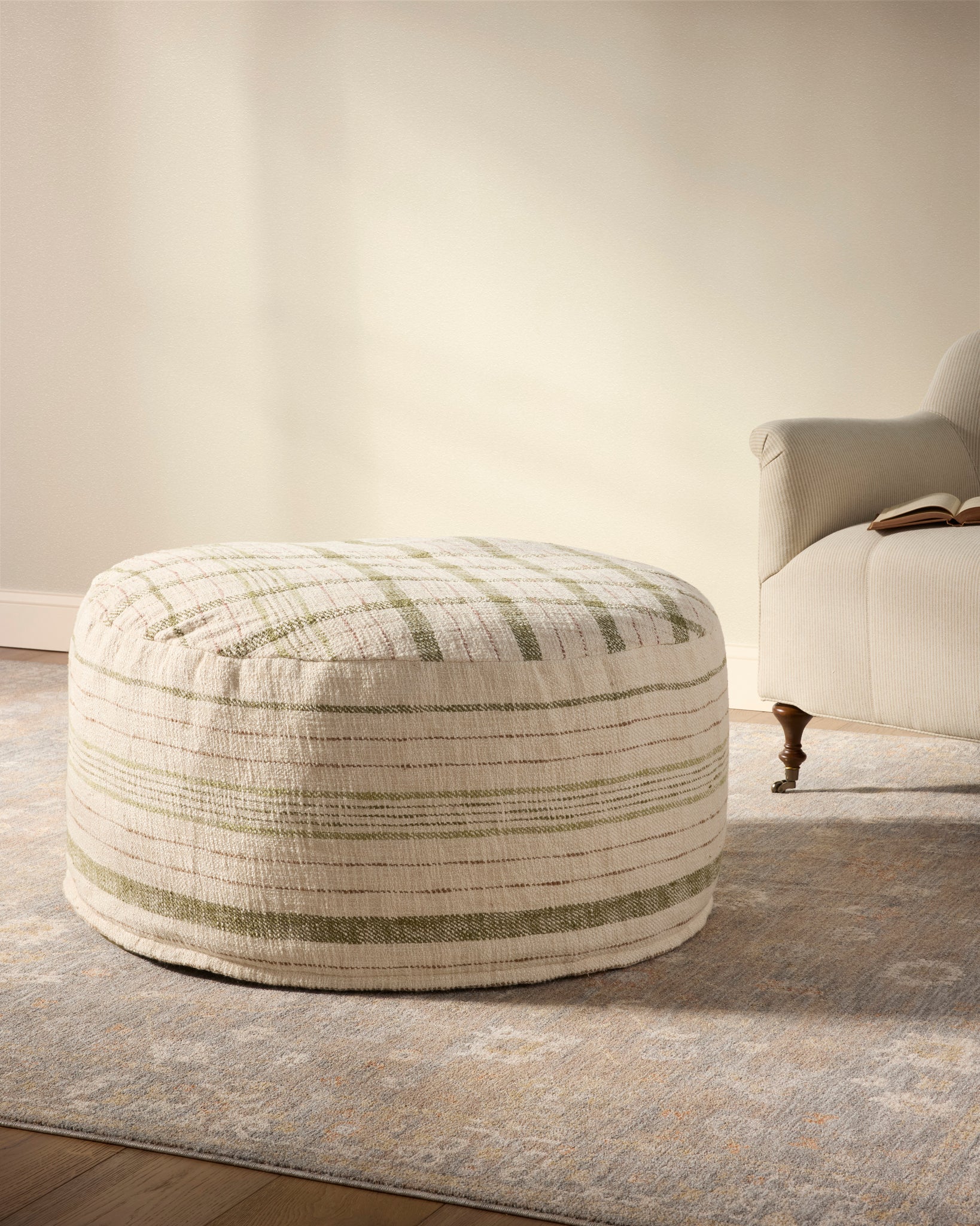 Wallace Cream Cream Pouf shown from another angle.