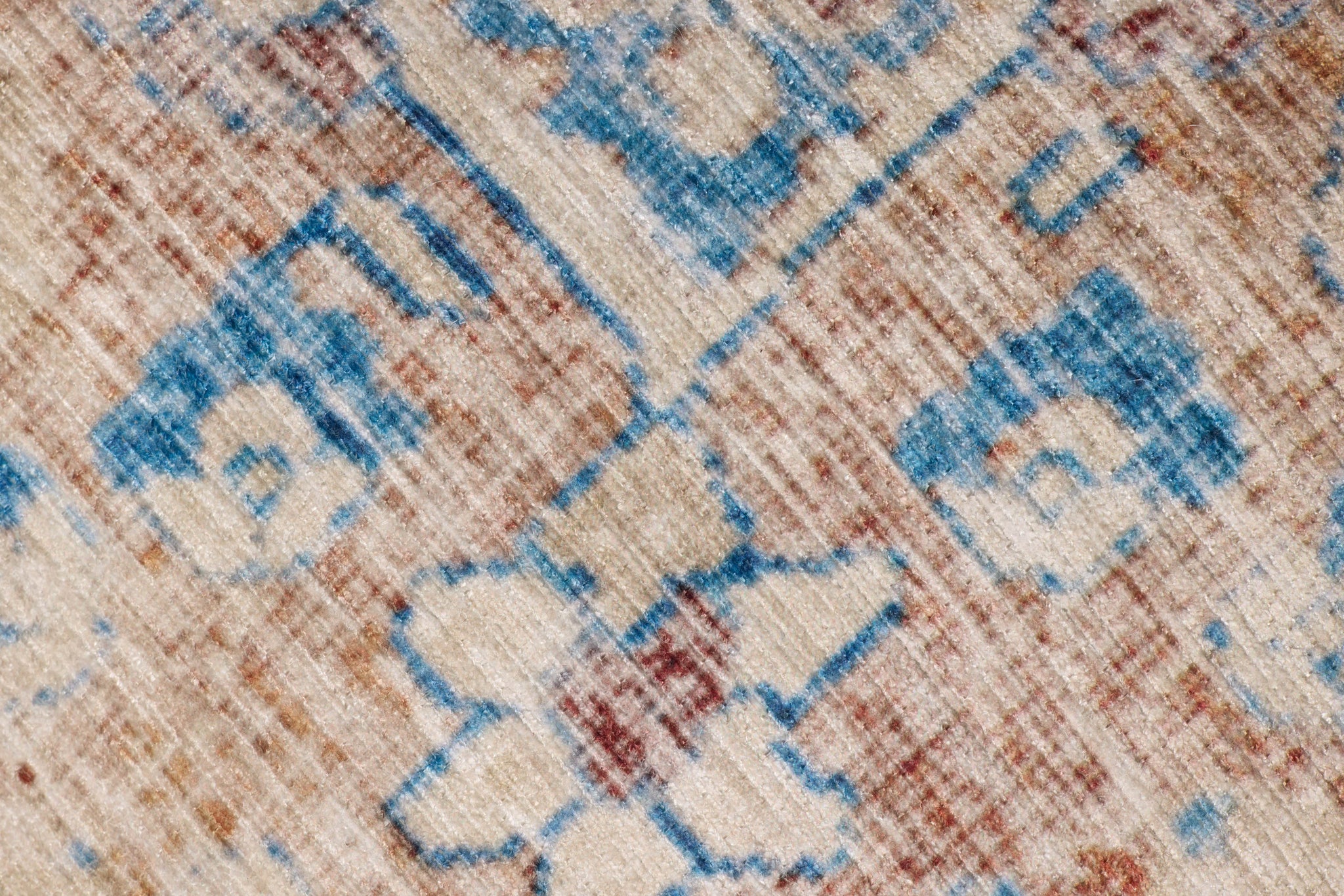 Blue / Tangerine Pouf shown from a different angle to reveal its pattern.