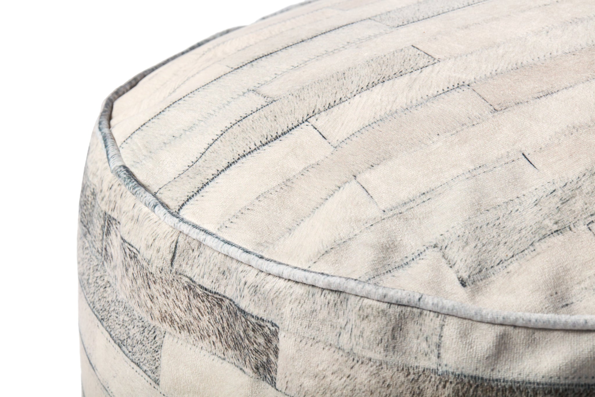 Ivory / Grey Pouf shown from a different angle to reveal its pattern.