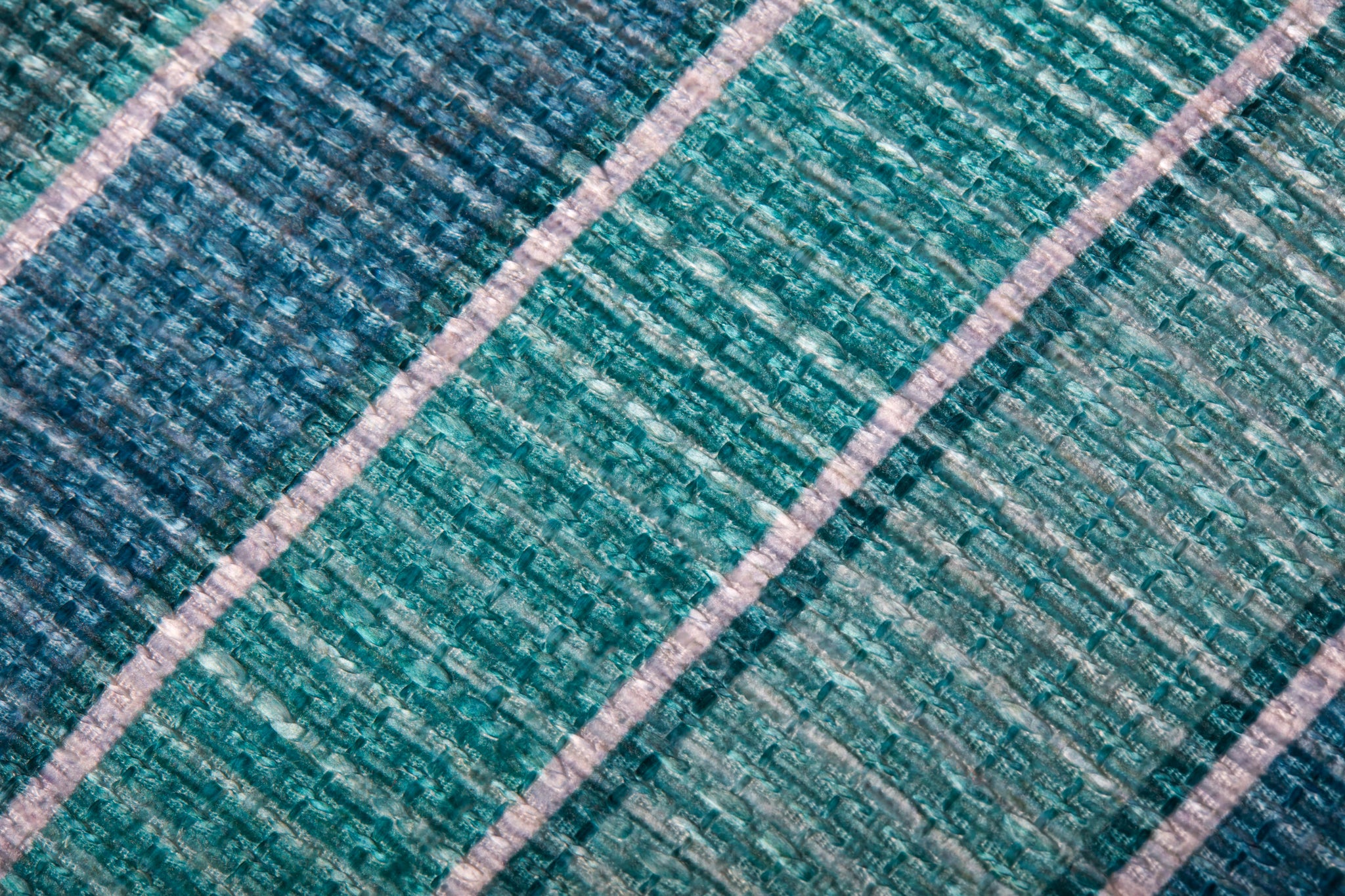 Poufs Lagoon / Blue shown from a different angle to reveal its pattern.