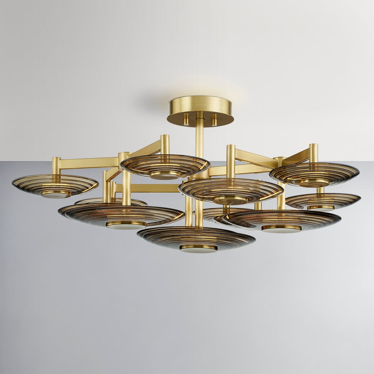 Close-up of the Griston Semi Flush 44" in aged brass showing the shade profile and mounting canopy.