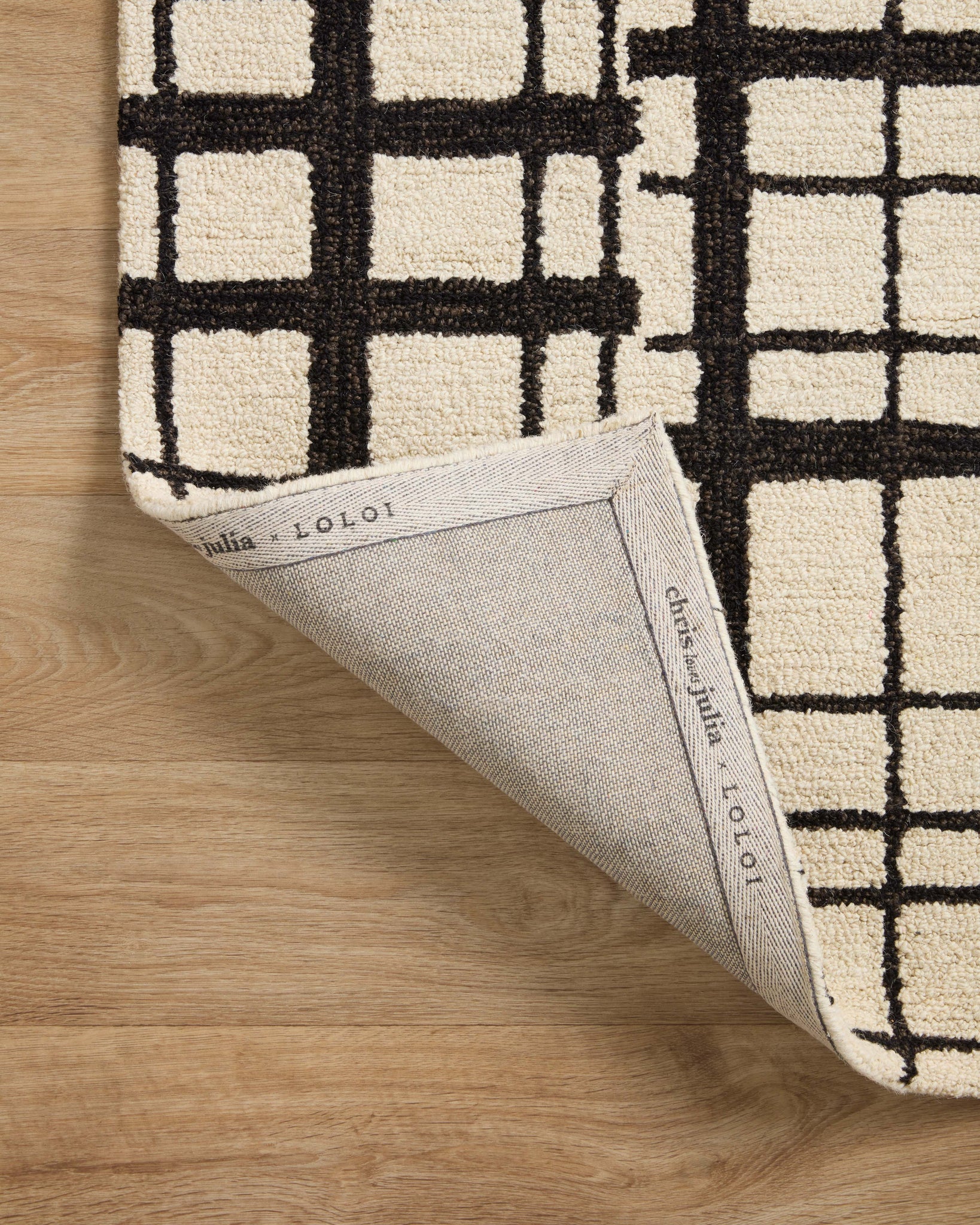 Polly Black / Ivory shown from a different angle to reveal its pattern.