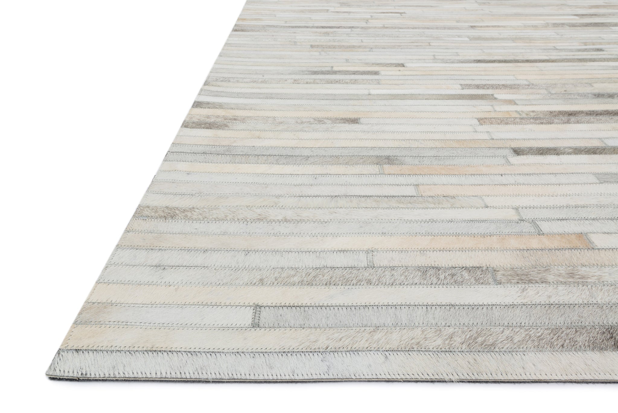 Side view of the Promenade Ivory rug.