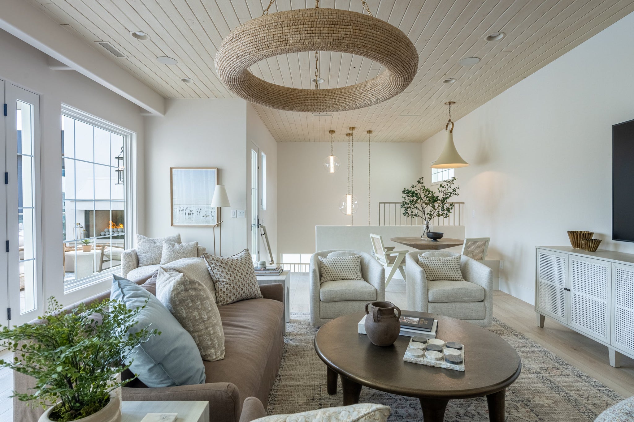 Pearce Floor Lamp styled in a reading nook for warm, layered light at Laurie Yapp Home.