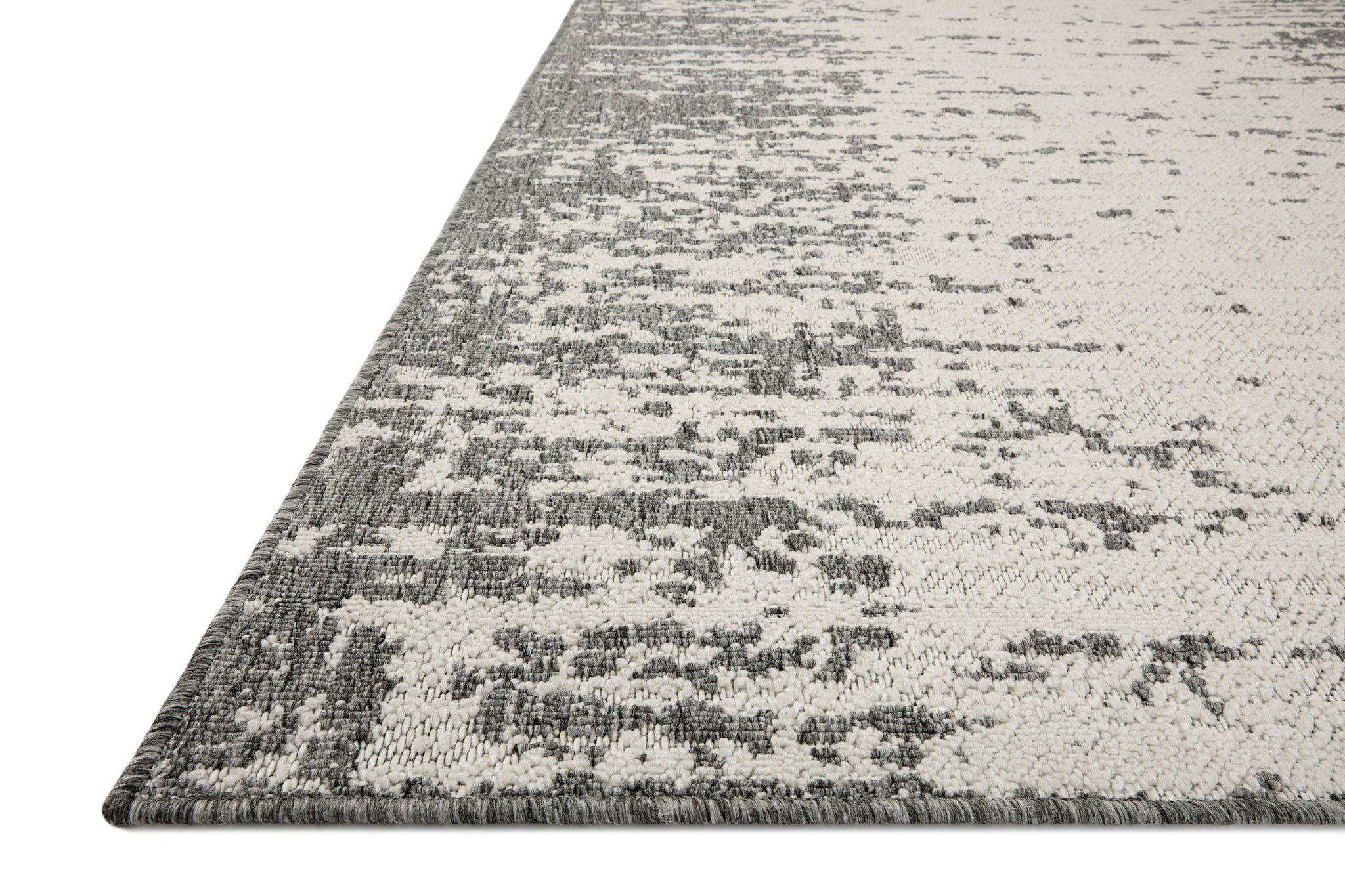 Rainier Ivory / Grey shown from a different angle to reveal its pattern.