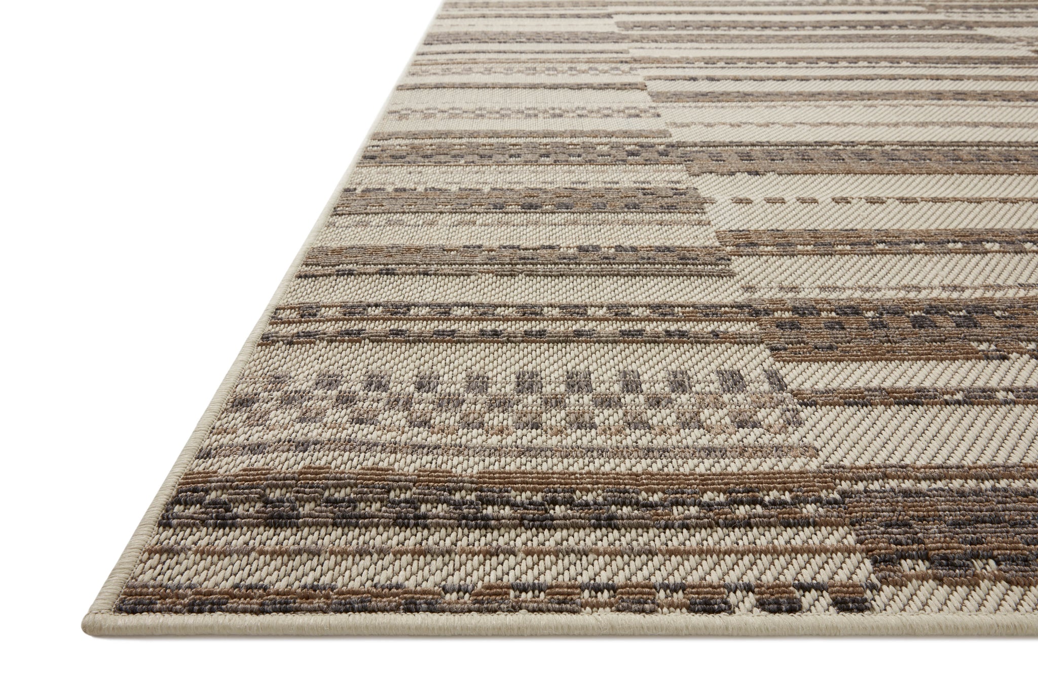 Rainier Ivory / Taupe shown from a different angle to reveal its pattern.