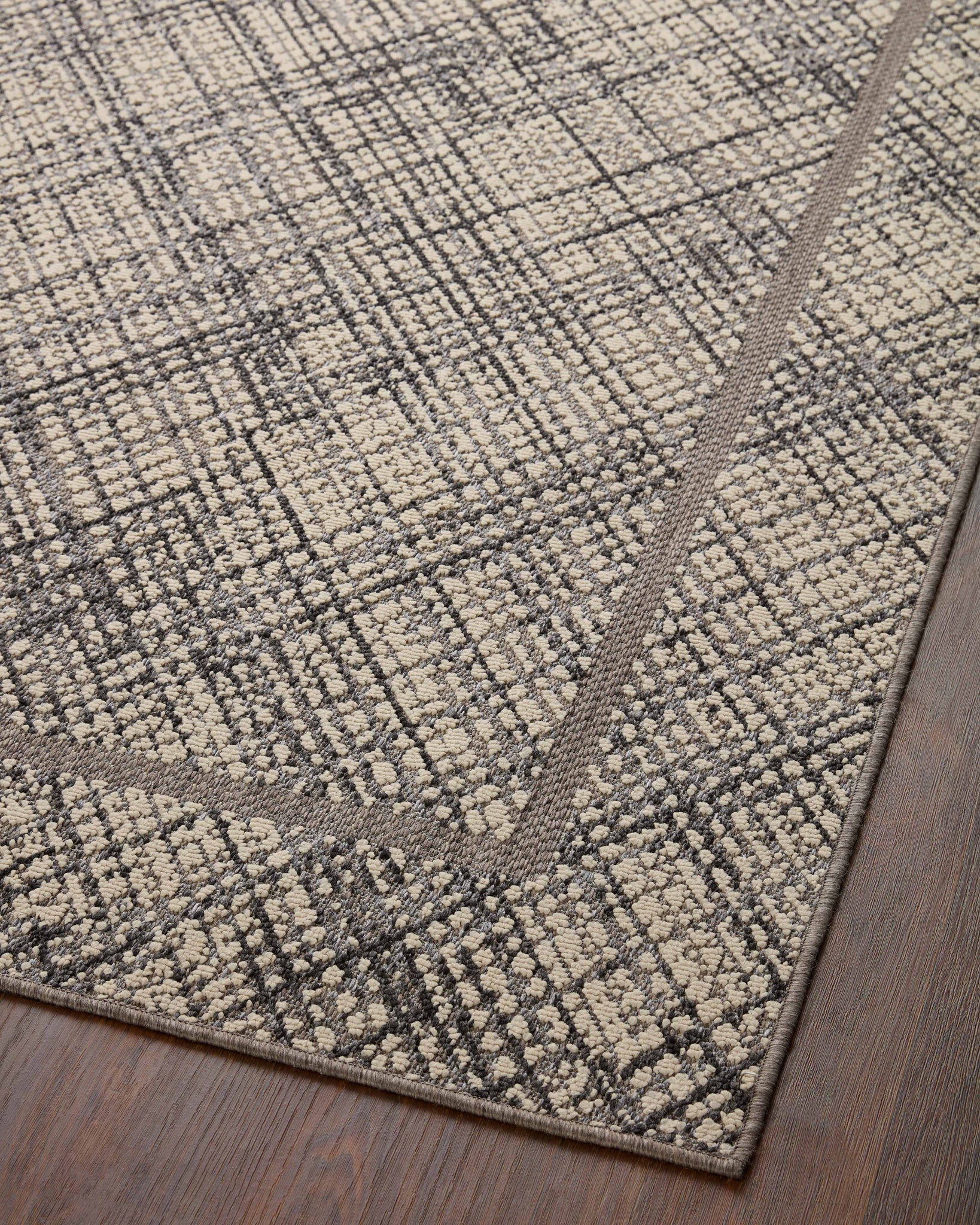 Rainier Ivory / Charcoal shown from a different angle to reveal its pattern.
