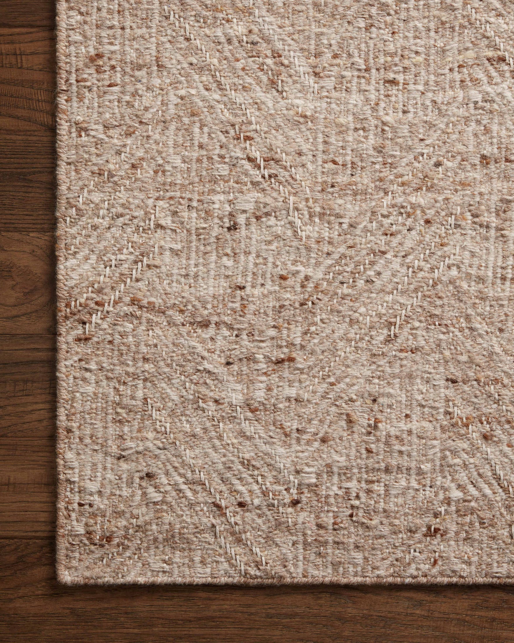 Side view of the Raven Oatmeal / Natural rug.