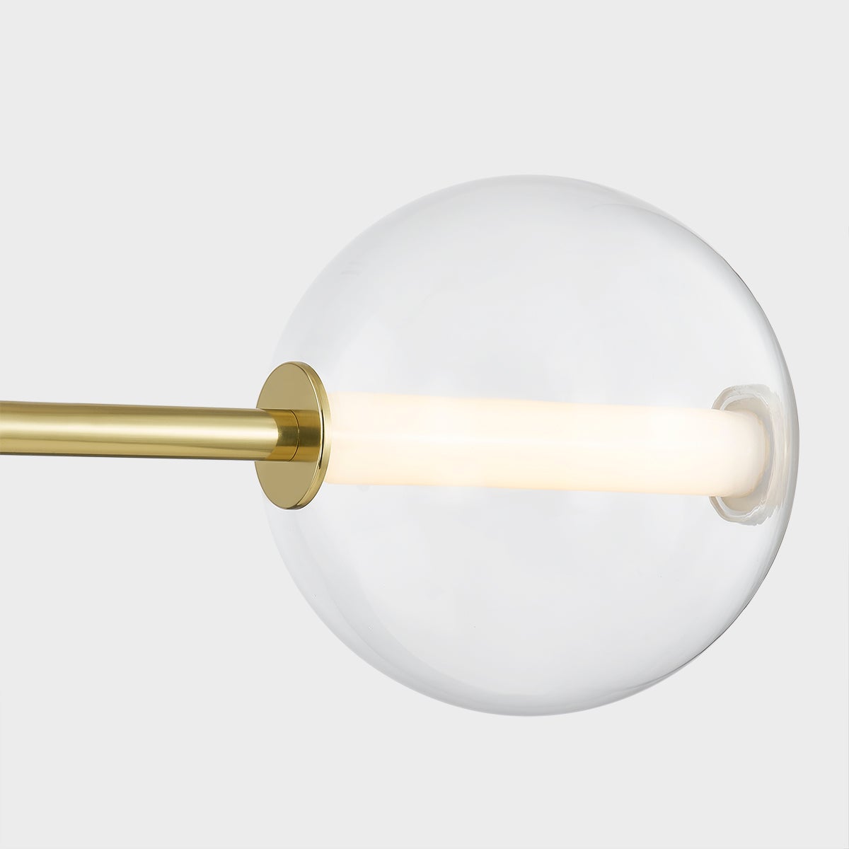 Richford Linear in aged brass shown from the front to reveal the extended frame and shade array.