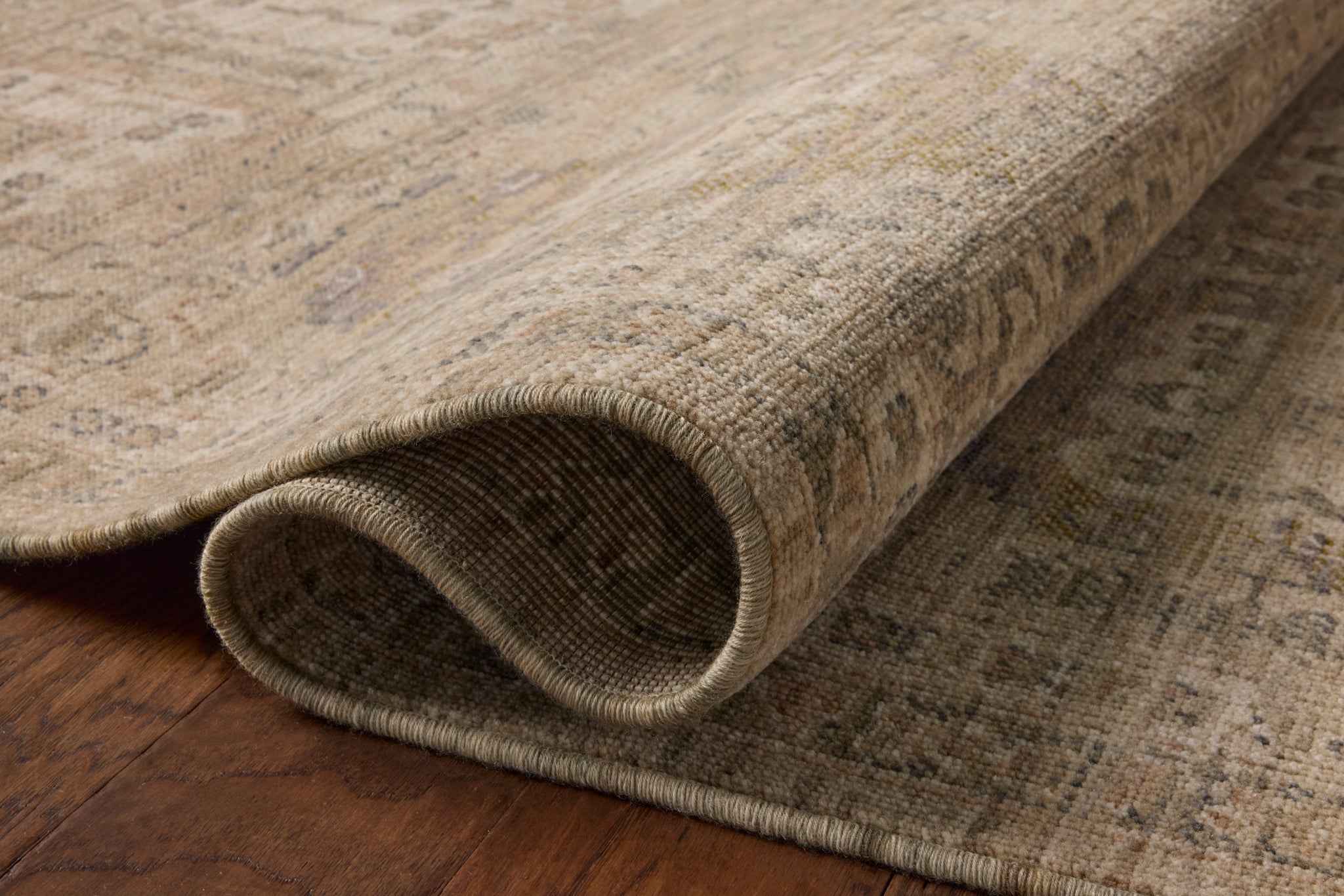 Reign Linen / Lilac styled underfoot in a layered living room at Laurie Yapp Home.