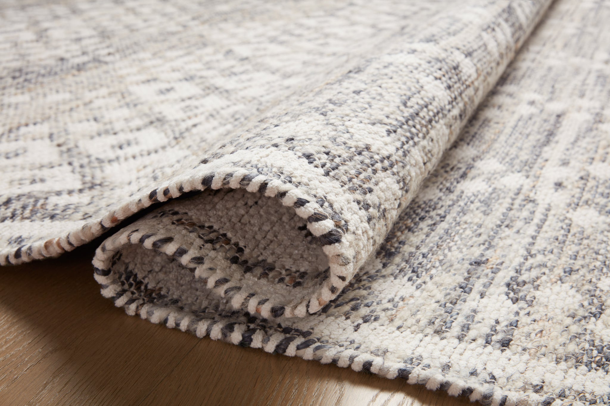 Rivers Denim / Ivory shown from a different angle to reveal its pattern.