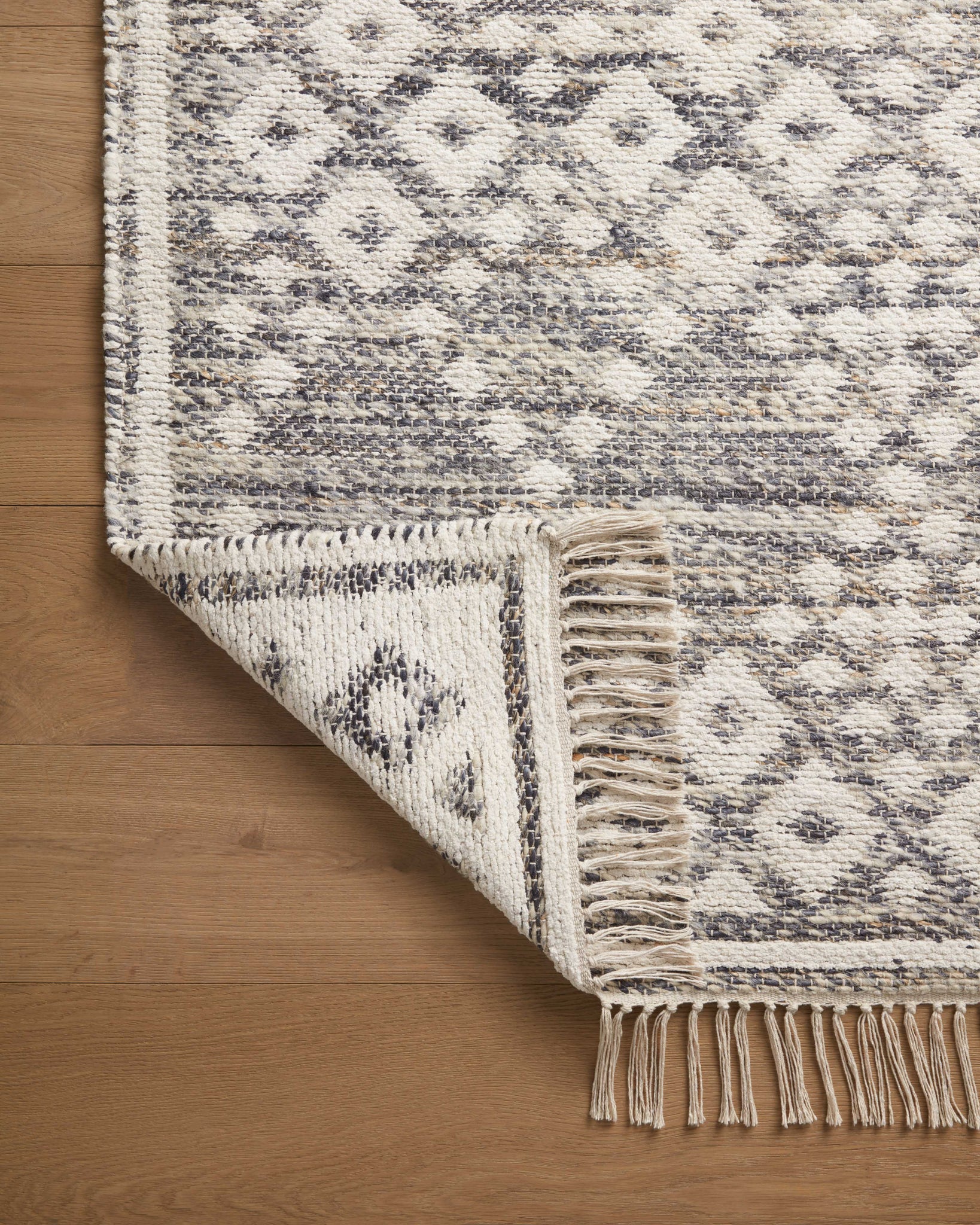 Rivers Denim / Ivory shown from a different angle to reveal its pattern.