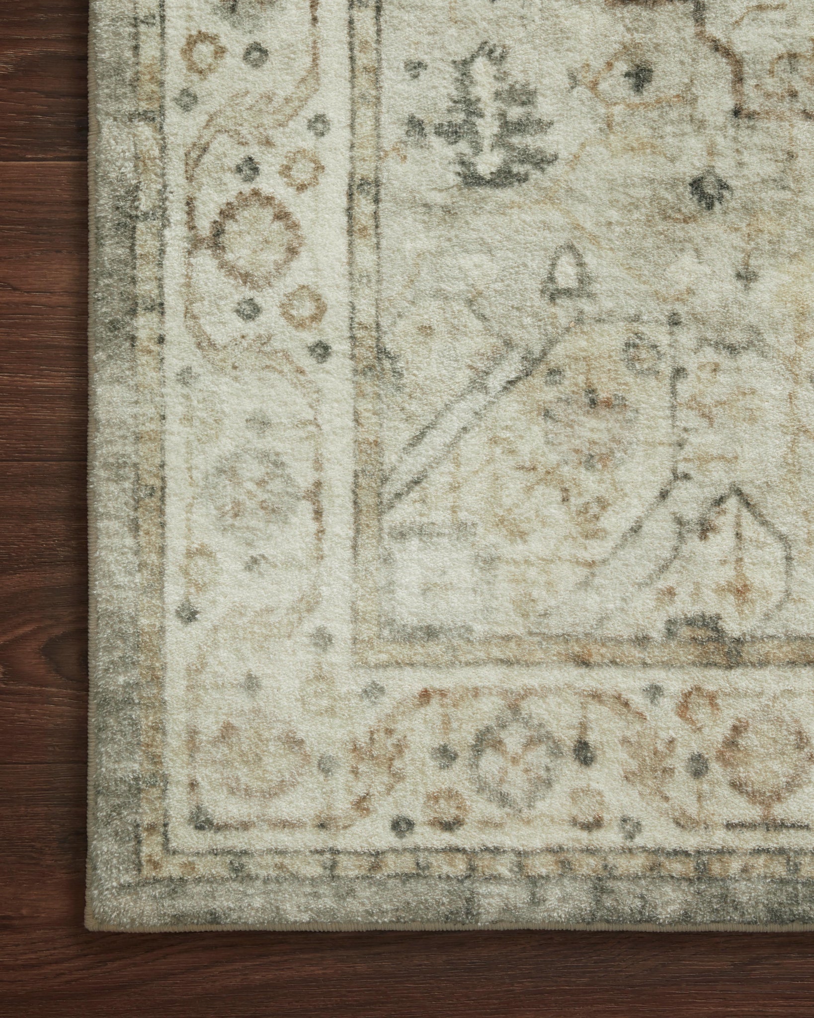 Rosette Sage / Beige shown from a different angle to reveal its pattern.