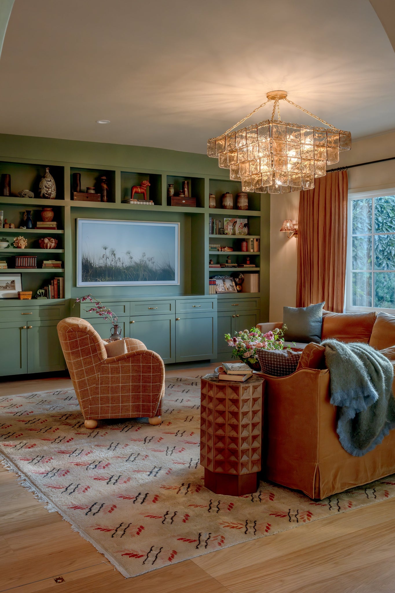 Regal Chandelier 36" styled in a formal living room for warm, layered light at Laurie Yapp Home.