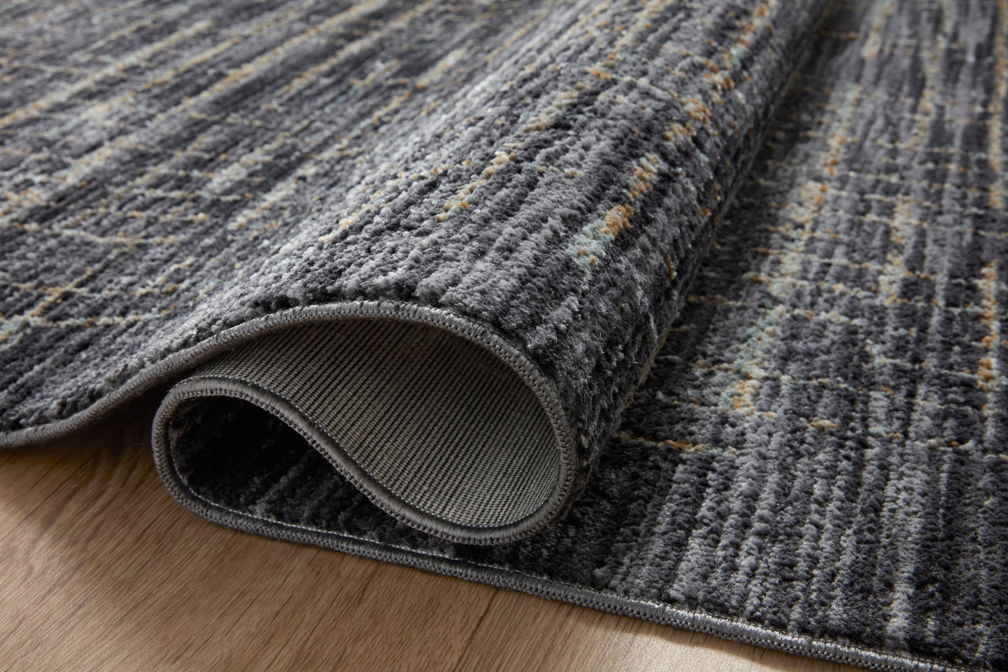 Close-up detail of the Soho Onyx / Silver showing its pile and weave.