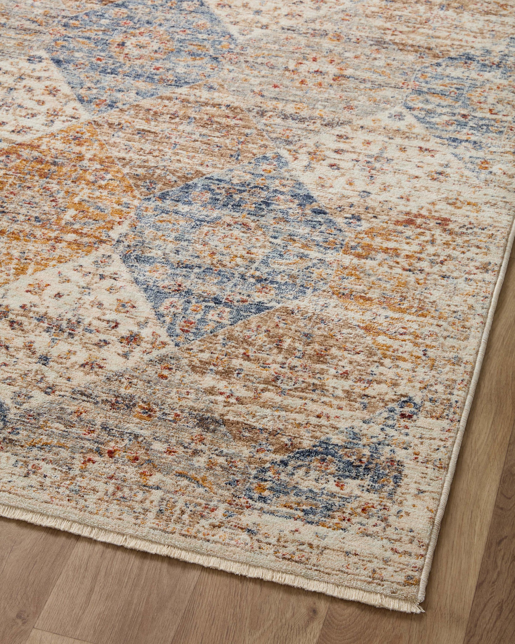 Sorrento Ivory / Multi shown from a different angle to reveal its pattern.
