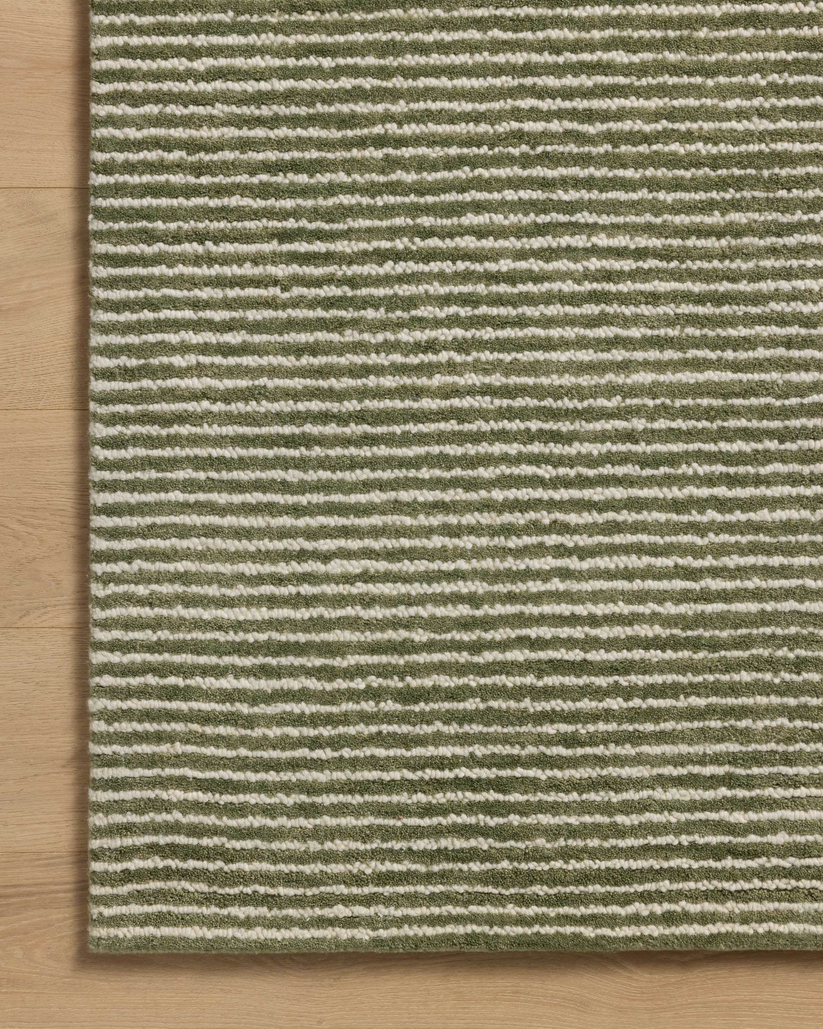 Sunday Olive / Ivory shown from a different angle to reveal its pattern.