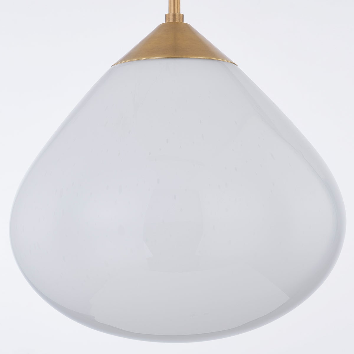 Semilla Pendant 18" shown from the front to reveal the shade shape and metal detail.