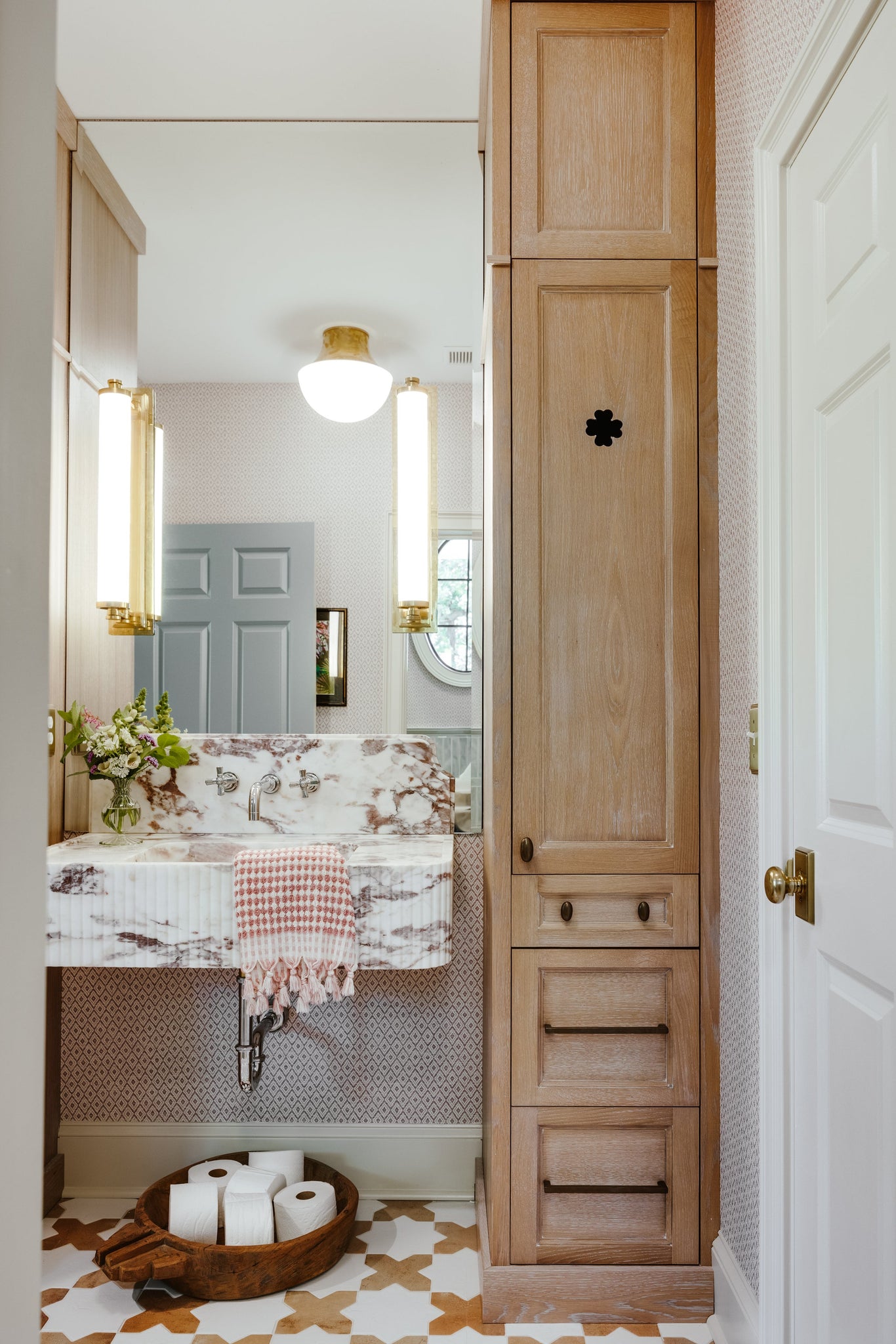 Lettie Flush Mount 14.75" in aged brass styled in a bedroom for warm, layered light at Laurie Yapp Home.
